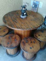 This is a great repurpose idea. Spool Table With Small Spool Seats I Was So Fortunate To Find These At A Local Yard Sale Spool Furniture Spool Tables Wooden Spool Tables