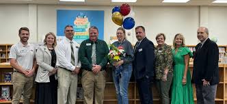 Please join us in...