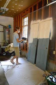 Priming And Painting Trim With A Paint Sprayer And By Hand Painting Trim Painted Interior Doors Updating House