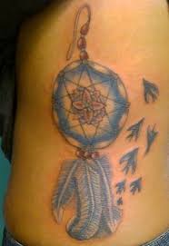 In the photo, the teen star is laying down on a blanket with a tattoo artist working on her side tattoo…and she's topless. Dream Catcher Tattoos With Quotes Quotesgram