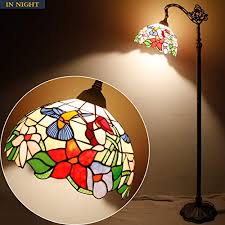 Tiffany lamps' value can be anywhere from $4,000 to over $1 million. Tiffany Style Reading Floor Lamp Lighting W12h64 Led Bulb Included Stained Glass Hummingbird Design Lampshade Antique Adjustable Arched Standing Base S101 Werfactory Lamps Lover Bedroom Beside Gifts Pricepulse