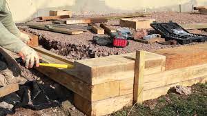 Maybe you would like to learn more about one of these? Building A Wall With Oak Sleepers Trc Garden Youtube