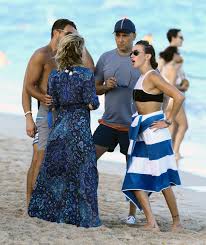 She made her 4 million dollar fortune with arrow, the flash, romeo killer: Emily Bett Rickards At A Beach In Miami 12 31 2015 16 Hawtcelebs