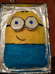 She loves me, she loves me now. Minion Themed Birthday Cake Rectangular Cake Cute In The Shape Of A Minion I Colored The Frosting The Colors O Themed Birthday Cakes Minion Cake Fancy Dinner