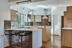 I Really Love The Interesting Look Of These Kitchen Cabinets It Almost Looks Like They Are Rimmed With Metal Custom Kitchens Kitchen Cabinetry Custom Kitchen