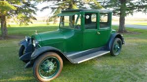 Image result for Scaraba Green 1930 Oldsmobile