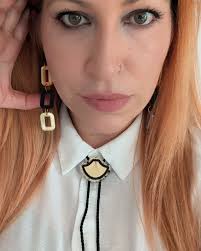 Made myself a bolo tie to go with my favourite earrings. What do you think?  More Bolo ties? #bolotie #blackandgold #madeintheuk #handmadejewelleryuk