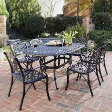 Shop style selections glenn hill set of 2 brown metal frame swivel dining chair(s) with tan cushioned seat in the patio chairs department at lowe's.com. Home Styles Biscayne 7 Piece Black Frame Patio Set Lowes Com Wrought Iron Patio Furniture Metal Patio Furniture Aluminum Patio Furniture