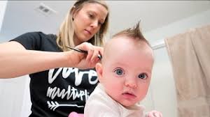 BABY'S FIRST HAIRCUT