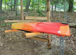 The padding are just a few pipe insulation tubes, cut and placed to cushion the boat. Diy Building A Wood Kayak Rack For Outdoor Storage Buytoolbags