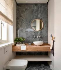 Moderne Gaste Wc Ideen Mit Grauem Naturstein Und Konsolentisch Berthe Nic Gaste Wc Akzentwand Gaste Wc Ideen