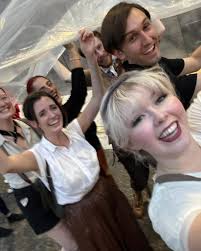 things we're taking into 2025: local theater • being overdressed • used  books • cheering