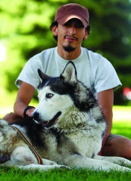 Jordan Salinas, the Idaho In-N-Out hero, shares a peaceful moment with his loyal husky companion