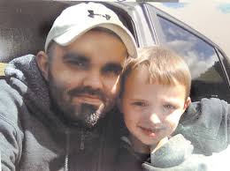 Police say accused murderer has son and is