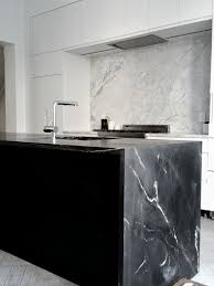 Black And White Marble Kitchen Countertops Take A Look At How Stunning This Black Moon Soapstone Island With A Waterfall Looks It Works Per Kitchen Marble White Marble Kitchen Black Marble Countertops
