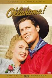 Is a 1999 musical film directed by trevor nunn, choreographed by susan stroman, and starring hugh jackman as curly mclain, josefina gabrielle as laurey williams, and maureen lipman as aunt eller. Let Us Now Talk Very Seriously About Oklahoma The Toast