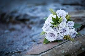 Why is the periwinkle flower called the madagascar flower? Light Periwinkle Bridal Bouquet Roses