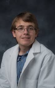 Downtown banners showcase University of Iowa student researchers