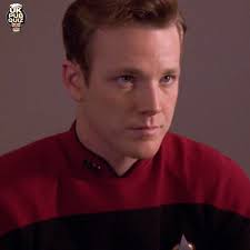 Who is the character in Star Trek: The Next Generation that resembles  Mister Mxyzptlk?