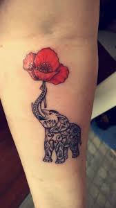 Elephant Holding A Poppy Tattoo Elephant Tattoo Small Elephant Tattoo Poppies Tattoo