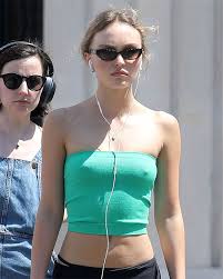 Explore Lily-Rose Depp's world of sensual tits and raw beauty