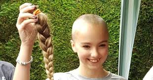 Teen Jade's close shave boosts charity