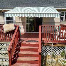 Aleko 20 Ft Motorized Retractable Awning 120 In Projection In Green And White Stripe Awm20x10grwhstr00 Hd The Home Depot Patio Awning Landscaping Around Patio Patio