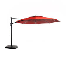 In my neighborhood, trash pickup is on monday morning. Simplyshade 11 Ft Red Solar Powered Auto Tilt Cantilever Patio Umbrella With Base In The Patio Umbrellas Department At Lowes Com