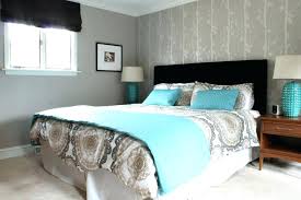 The grey walls and sofas are prevented from falling flat with the addition of a bright yellow rug, pink and yellow cushions and an elegant turquoise coffee table. Teal And Grey Bedroom Ideas Gray Dark Atmosphere Pink Light Blue Decorating Turquoise Black Lavender Bedrooms White Apppie Org