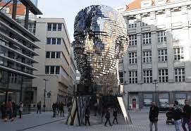 Outside of the kafka museum, prague. A Rotating 42 Layer Sculpture Of Franz Kafka S Head By David Cerny Colossal