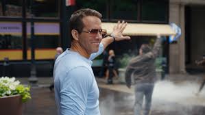 Free guy is a big, warm hug of a movie with plenty to love, even if you're not super into bubble gum ice cream, swing sets and vintage mariah carey like ryan reynolds' goodhearted title character. Free Guy Review Ryan Reynolds Comedy Leans Into Cheerful Depth