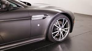 Image result for Titanium Silver 2010 Aston Martin