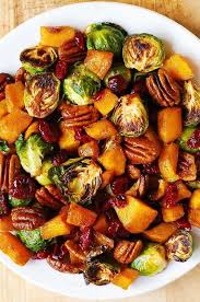 Best vegetables for christmas dinner. Thanksgiving Roasted Brussels Sprouts And Cinnamon Butternut Squash With Peca Healthy Thanksgiving Recipes Vegan Thanksgiving Recipes Thanksgiving Side Dishes