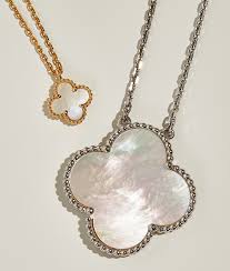 The diamond set necklace can be devided into 3 seperate parts. How To Spot Real Van Cleef Alhambra