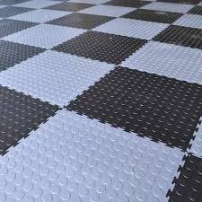 When choosing garage floor tiles for your home, never before has there been such a large range of styles and materials to choose from. Industrial Pvc Coin Garage Tile Floors For Warehouses Buildings In 2021 Garage Floor Tiles Garage Floor Garage Tile