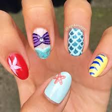Nail Art Inspired By Disney S The Little Mermaid Mermaid Nail Art Little Mermaid Nails Disneyland Nails