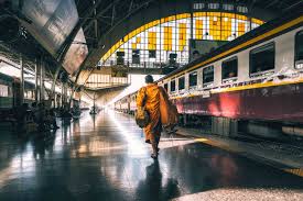 A Monk Walks Along The Platform Of Hua Lamphong Station In Bangkok Thailand Travel Thailand Trip