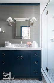 40 bathroom color schemes we're loving right now from warm and earthy to cool and modern, these colorful bathroom ideas will transform your space from boring to brilliant. Navy Blue And Gray Bathrooms Contemporary Bathroom Blue Bathroom Vanity Bathroom Feature Wall Blue Bathroom Walls