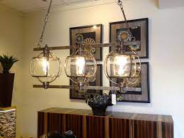The metal and accessories in gold go well with a. Dining Room Lighting Home Depot Gallery Dining With 1024x768 Wallpaper Teahub Io