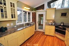 Yellow just might be the most cheerful color there is — which is just one of the reasons we think it's perfect for the kitchen (and the kitchn, as evidenced by our logo, hehe). Butter Yellow Cabinets Houzz