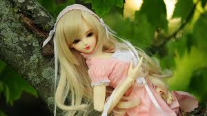 Click or touch on the image to see in full high resolution. Cute Barbie Doll On Tree Branch In Blur Green Leaves Background Hd Barbie Wallpapers Hd Wallpapers Id 62978