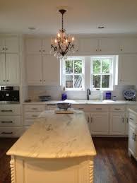 Most granite counters are polished to a glossy sheen, but you can also ask for a honed finish, which is much less shiny and more of a matte sheen. Marble Madness The Glam Pad Kitchen Marble Marble Kitchen Counters Marble Kitchen Island