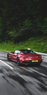 Rear View Aston Martin Dbs Superleggera On Road 1080x2160 Wallpaper Aston Martin Dbs Aston Martin Cars Superleggera