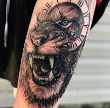 15 Best Lion And Clock Tattoo Designs Petpress Lion Head Tattoos Mens Lion Tattoo Lion Tattoo Sleeves