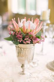 Classic Romance Wedding With All The Trimmings In Greece Protea Wedding Wedding Centerpieces Wedding Flower Arrangements