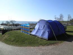 A mobile mains kit is much like a long extension cable whereby you plug it into an electricity source (campsite electric point or meter) and run the cable to where you need it to be (inside the tent) where you will have sockets or usb points to plug in. Our Pitch With Electric Hook Up And Water Tap All Pitches Have Great Views Picture Of Ladram Bay Holiday Park Otterton Tripadvisor