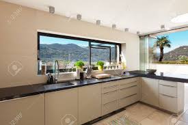 I wanna have a seat there and have a nice meal. Modern House Beautiful Interiors Of Domestic Kitchen Stock Photo Picture And Royalty Free Image Image 44117572