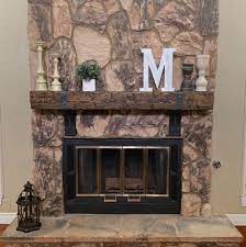 Rustic Fireplace Mantel With Metal Straps Bolts Custom Made Etsy Rustic Fireplace Mantels Rustic Fireplaces Tuscan Fireplace