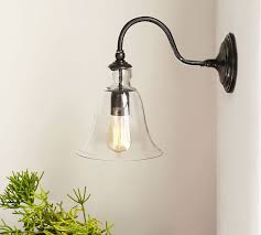 In addition, designs range from simple to formal, like the rustic cut mirrored tin sconce. Rustic Glass Outdoor Sconce Pottery Barn