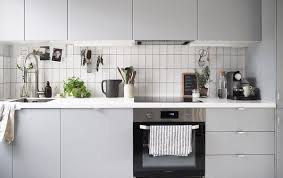 Check spelling or type a new query. A Grey Kitchen With White Tiles And A White Worktop Kitchen Inspiration Design Scandi Kitchen Kitchen Examples